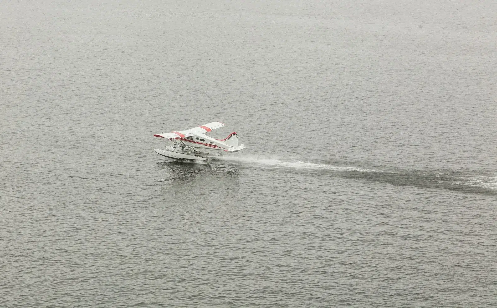 De Havilland Canada DHC-2 Beaver floatplane moored at Ketchikan, Alaska — the kind of backcountry flying bush trips are built around
