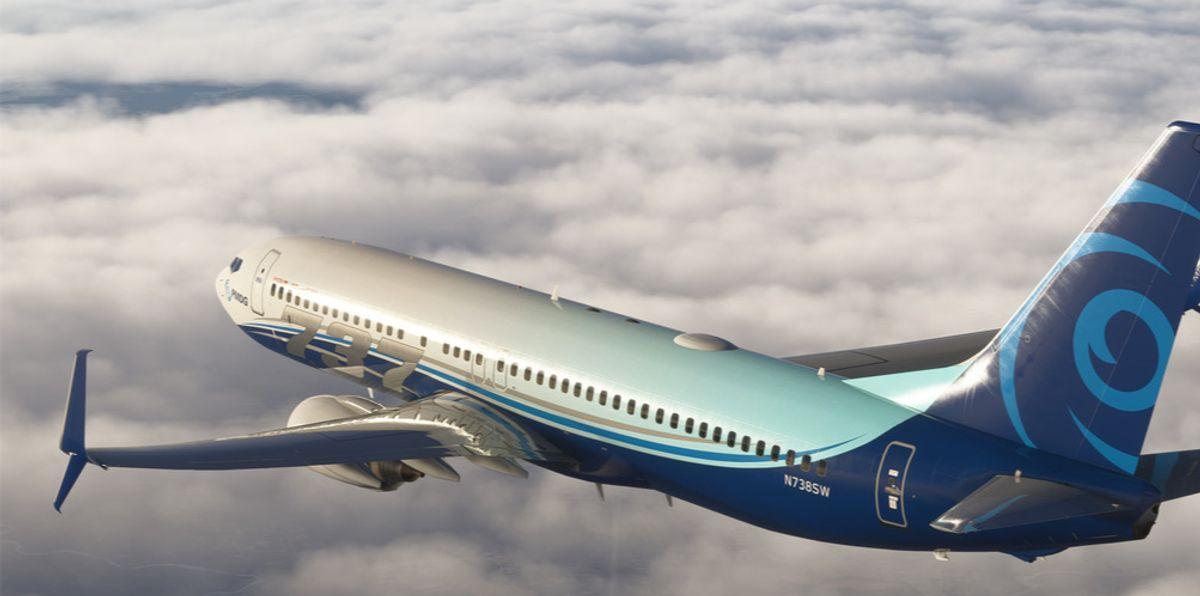 PMDG 737-800 cruising above the clouds in PMDG livery