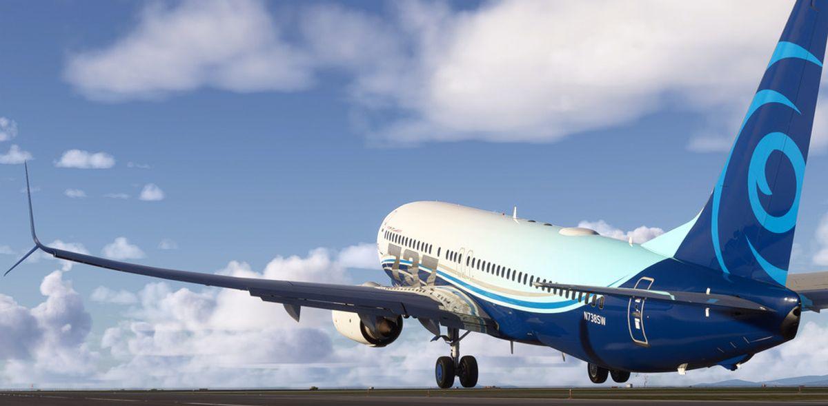 PMDG 737-800 rear quarter view on the runway, engines spooling for departure